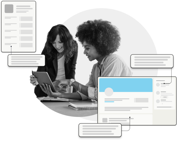 woman teaching other woman using computer with you eye graphics in the foreground