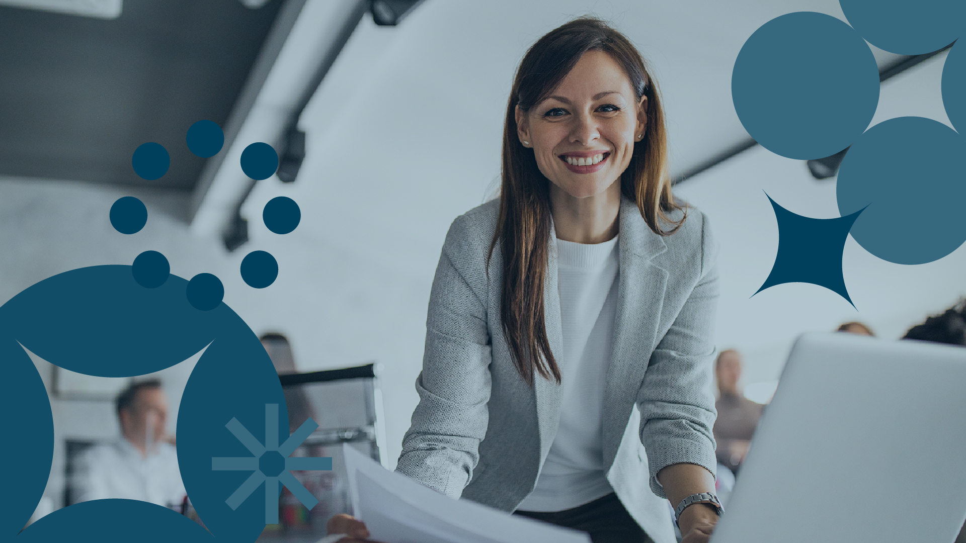 Female project manager working on business analysis on laptop with floating graphics